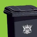 Black bin on green background