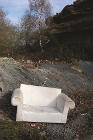 Fly tipped sofa