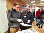 Councillors Damien Greenhalgh and Anthony Mckeown view the proposals at the exhibition