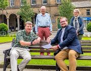 Glossop Creative Trust and the Council signing the agreement