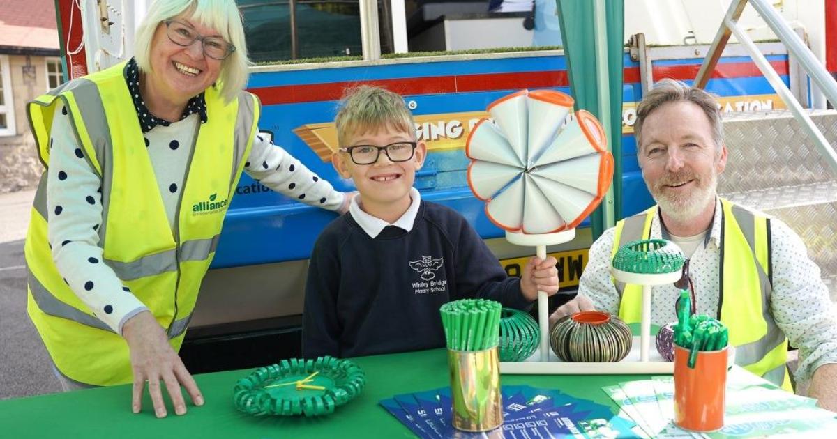 Pupils enjoy recycling in a bin wagon High Peak Borough Council
