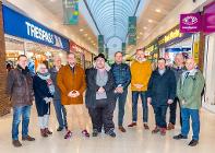 Group photo with Councillors Anthony Mckeown (centre) and Damien Greenhalgh (to his left) at The Springs