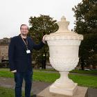Councillor Damien Greenhalgh with the newly reinstated urn on The Slopes in Buxton.